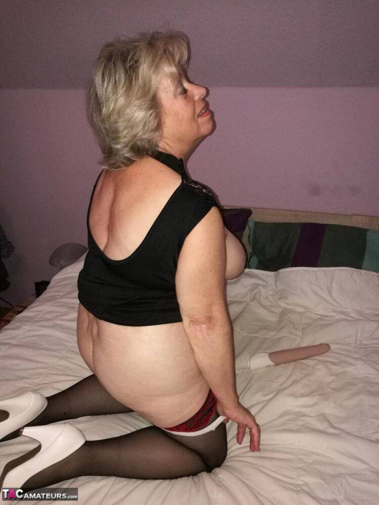 Horny old lady Caro removes white panties to dildo her pussy in sexy stockings - #10