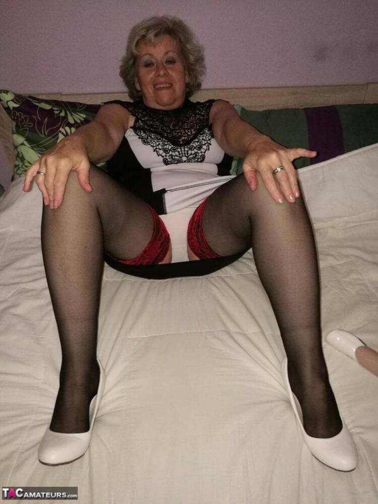 Horny old lady Caro removes white panties to dildo her pussy in sexy stockings - #6