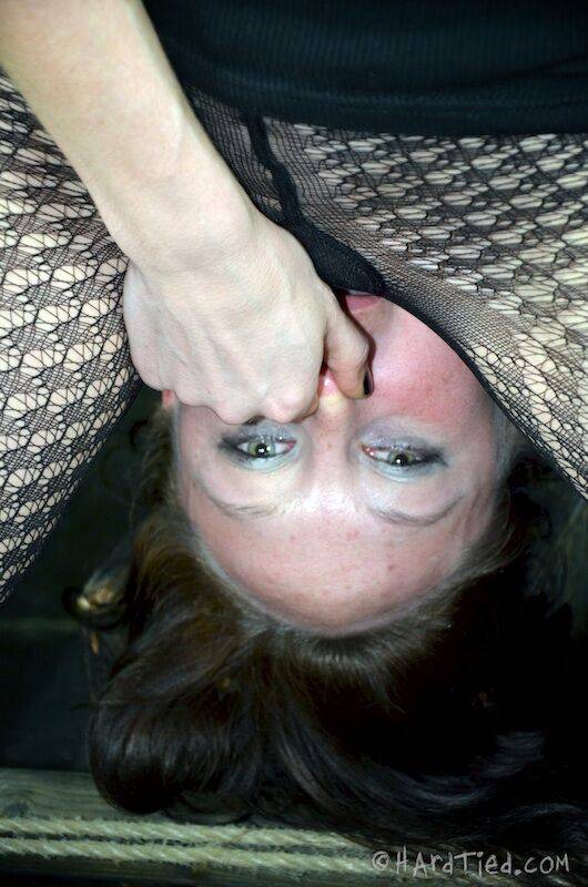White girl Poppy James is restrained and gagged in a dungeon by a lesbian - #1