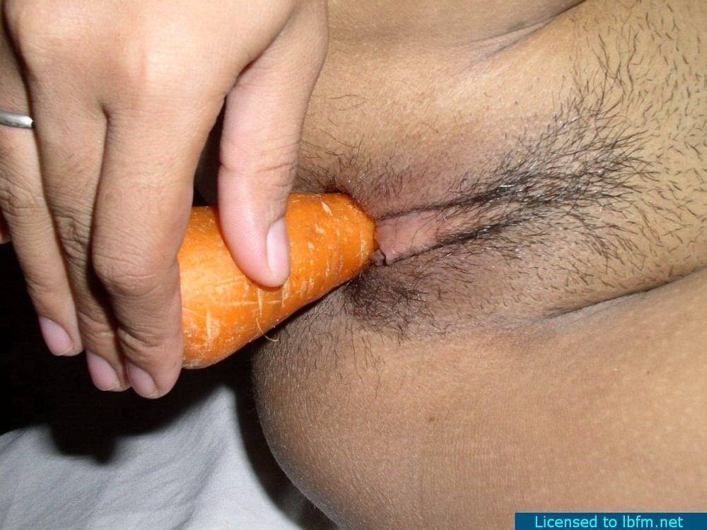 Asian amateur masturbates on top of white bed sheets with a carrot - #7