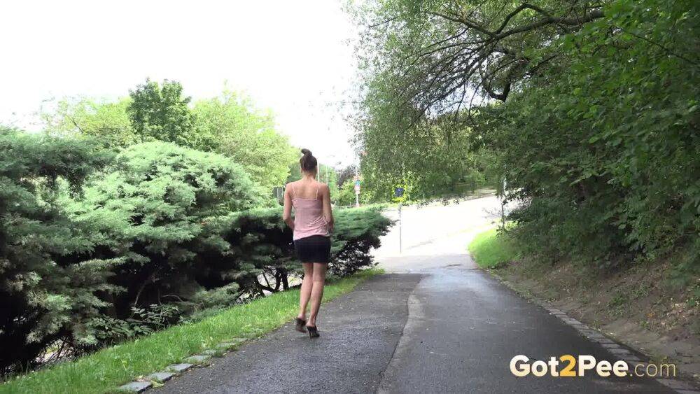 White girl hitches up her skirt to take a much needed pee outdoors - #14