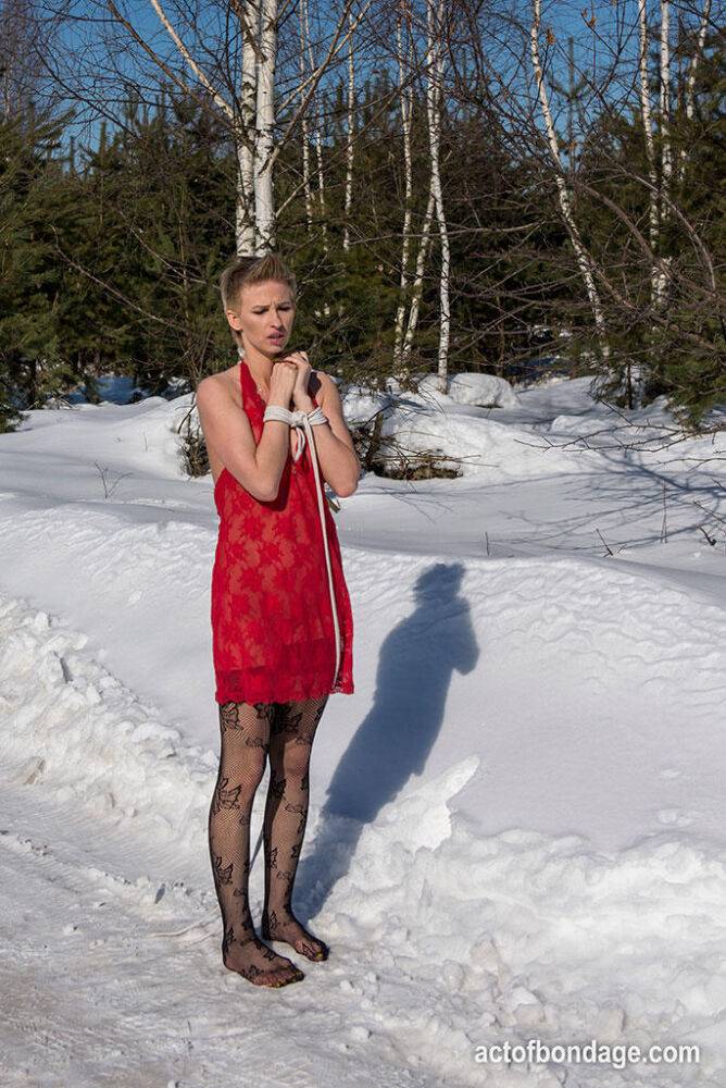 White female is toed up and forced to stand and kneel in snow - #5