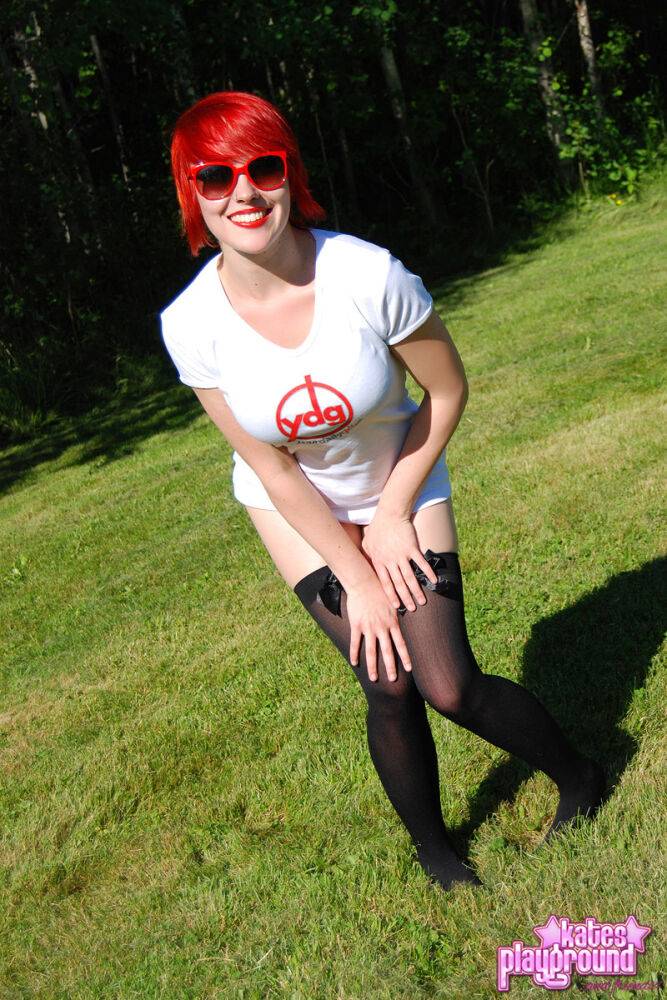 Redheaded amateur Sabrina soaks her white T-shirt out on a lawn in sunglasses - #10