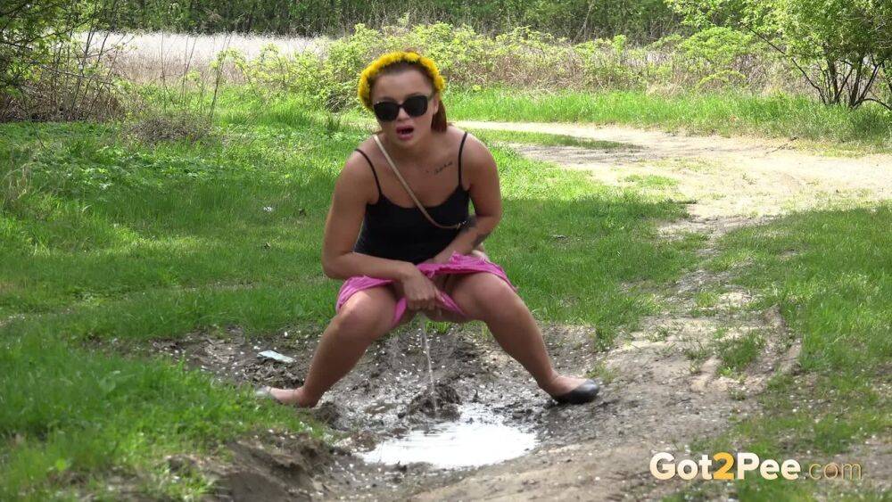 White girl Dafne pisses in a mud puddle while out for a walk in sunglasses - #7