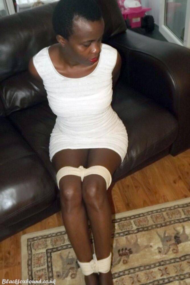 Black female is left tied and cleave gagged in a white dress on a leather sofa - #6