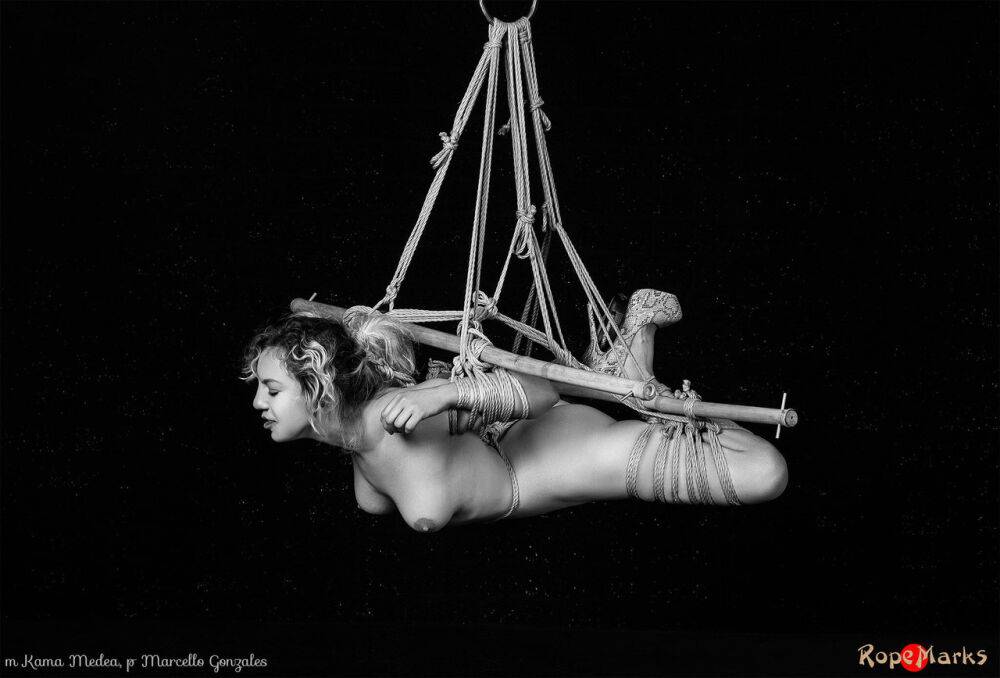 Naked white girl Kama Medea is suspended by ropes while anally hooked - #8