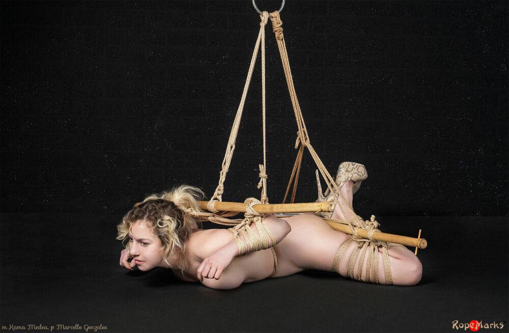 Naked white girl Kama Medea is suspended by ropes while anally hooked - #5
