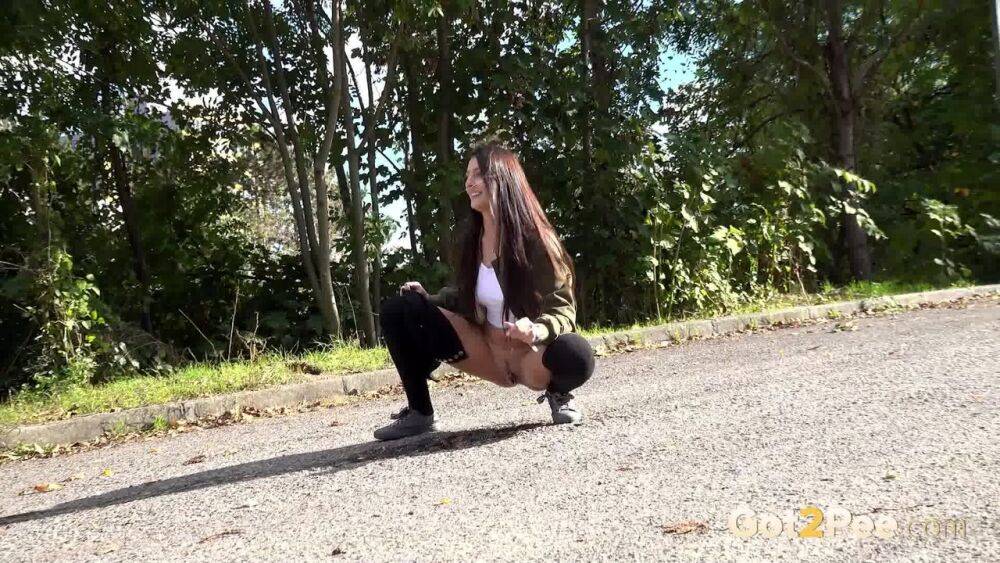 White girl Katy Rose takes a piss on a road while wearing hooker socks - #13