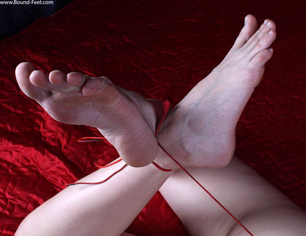 White girl is left face down on a bed while hogtied in the nude - #10