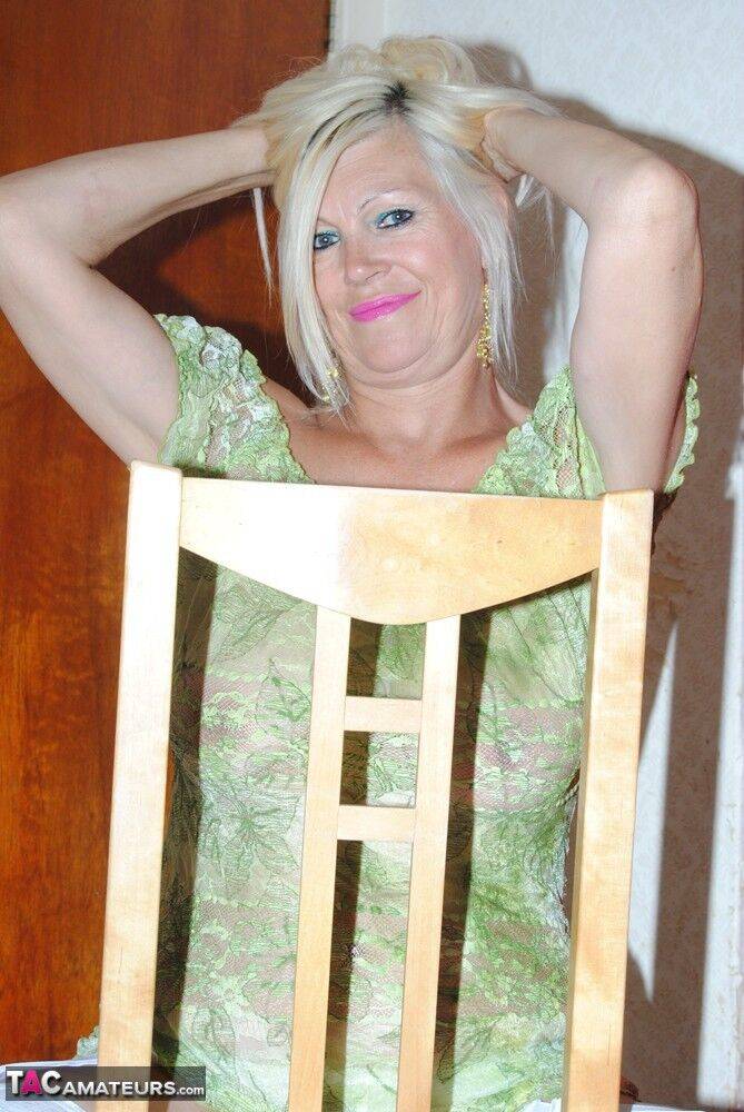 Middle-aged amateur Platinum Blonde displays her natural tits in white nylons - #16