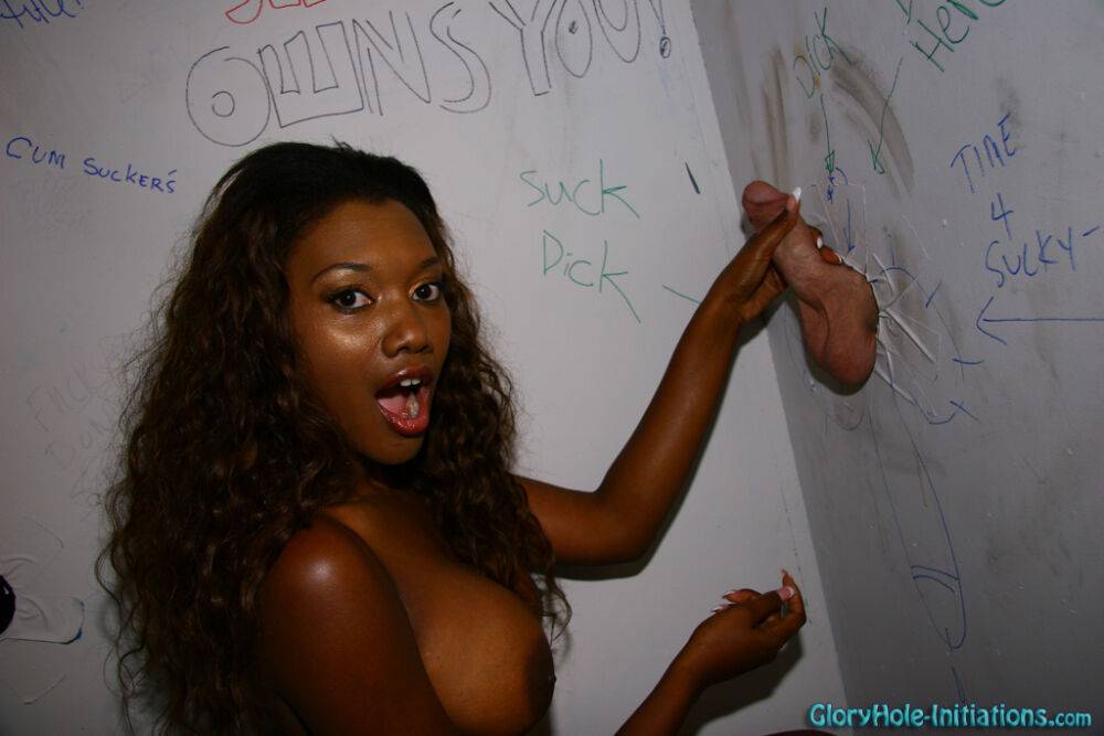 Black girl Nyomi Banxx sucks off a white cock thru a hole in a wall - #1