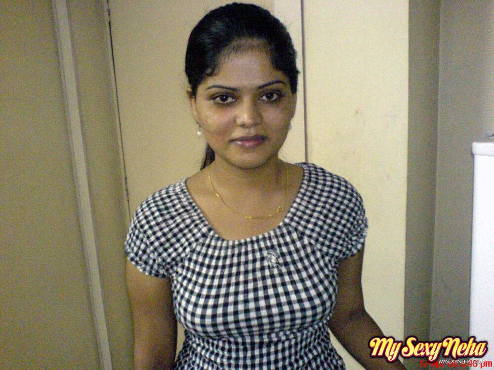 Chubby Indian girl Neha releases her breasts from white brassiere - #10