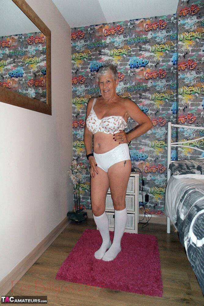 Silver haired granny Savana strips down to white knee socks in her bedroom - #10