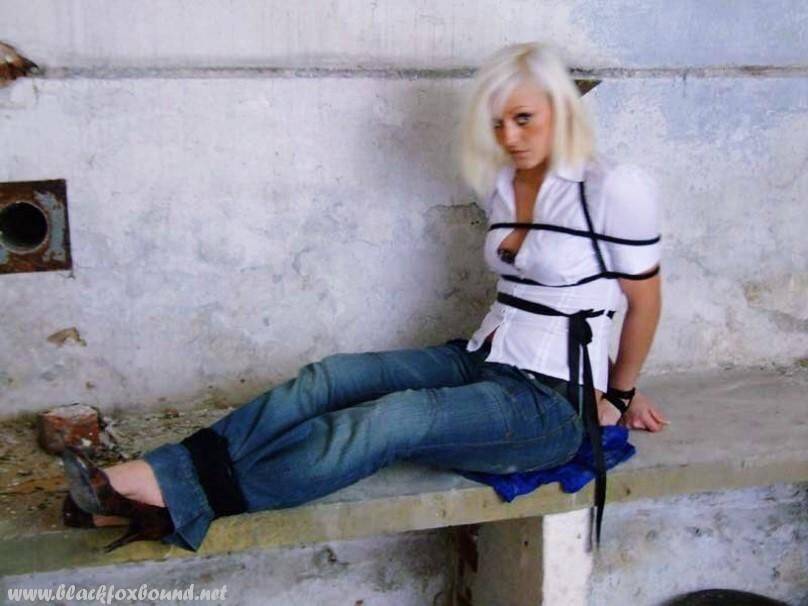 British woman is tied up and gagged in blue jeans and a white shirt - #8