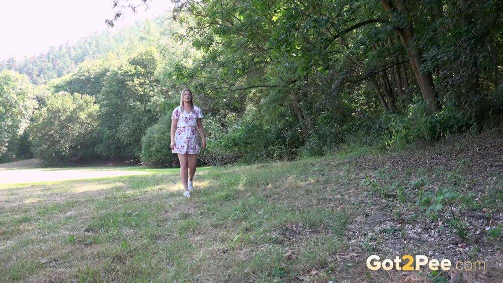 White girl Nikki Dream takes a piss in a field while out for a walk - #15