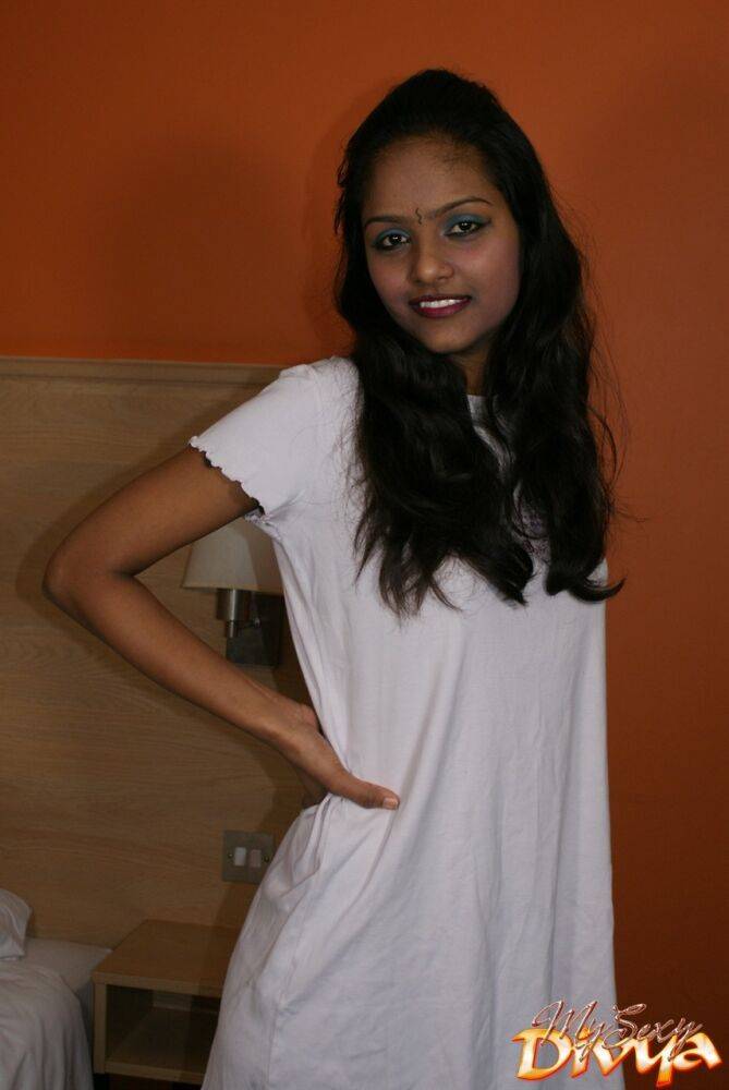 Indian female Divya lifts up a white dress to expose her vagina - #2