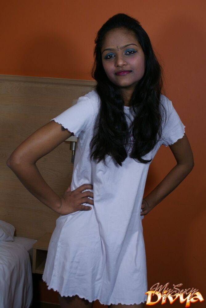 Indian female Divya lifts up a white dress to expose her vagina - #11