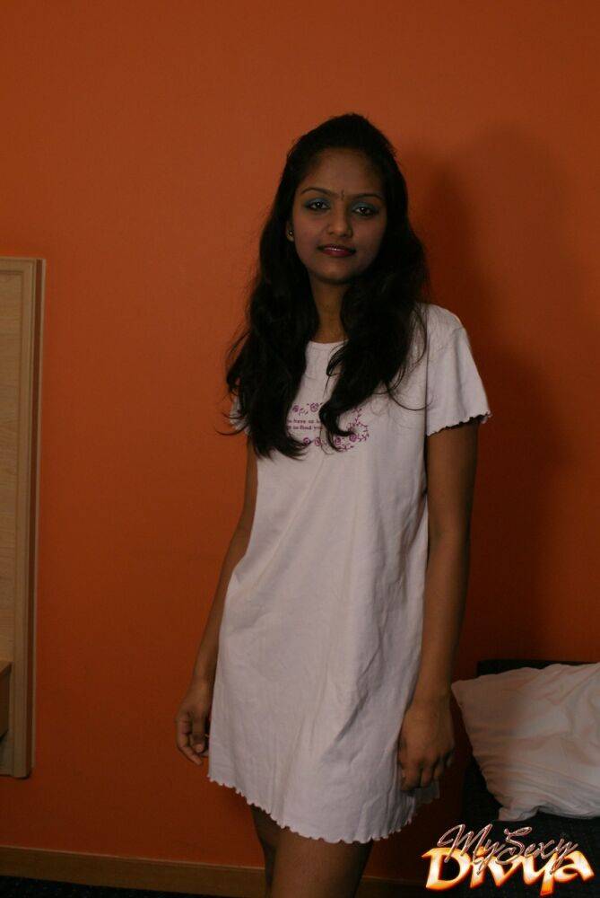 Indian female Divya lifts up a white dress to expose her vagina - #9