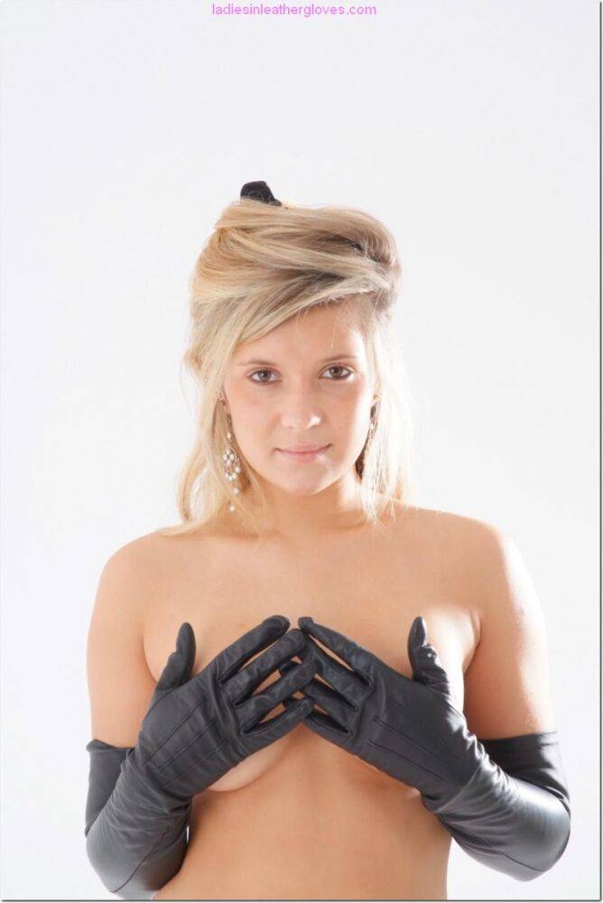 Blonde female touches her firm tits while wearing long leather gloves - #4