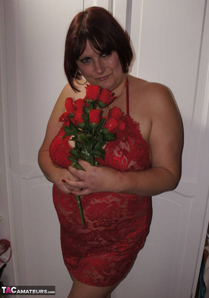 Busty mature lady holds roses while being joined by topless girlfriends - #15