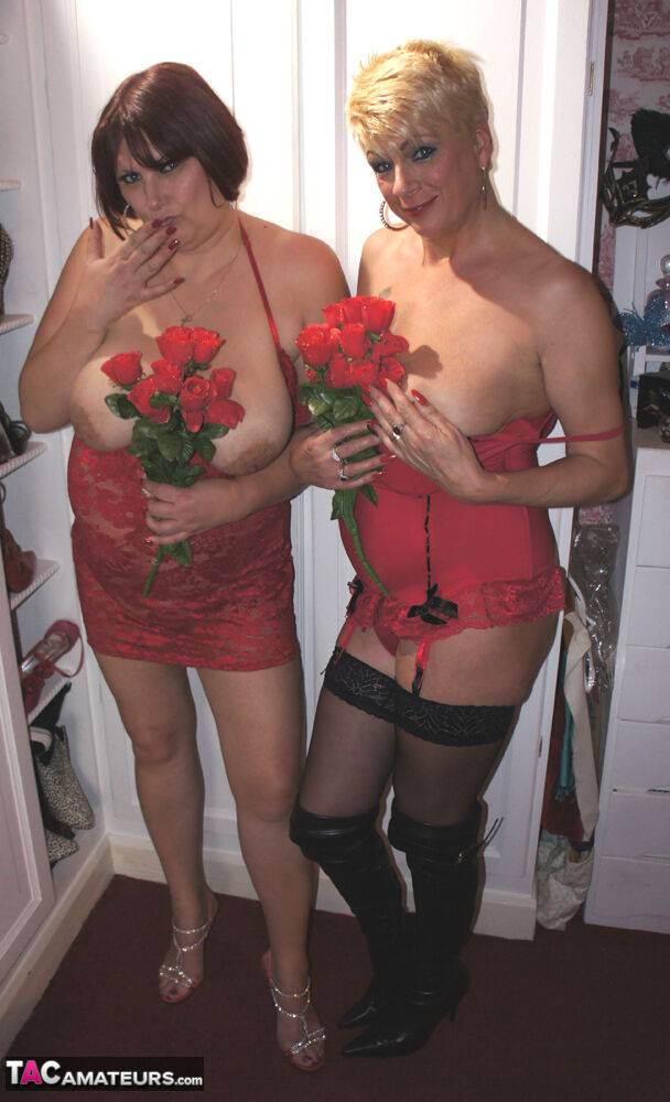 Busty mature lady holds roses while being joined by topless girlfriends - #5