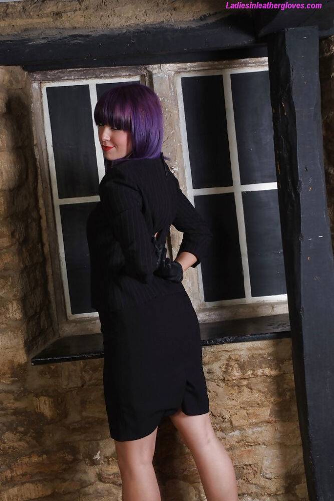 Pretty chick with purple hair poses fully clothed in black dress and pumps - #13