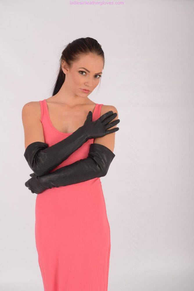 Solo model Cath sports long leather gloves while modelling in a dress - #12