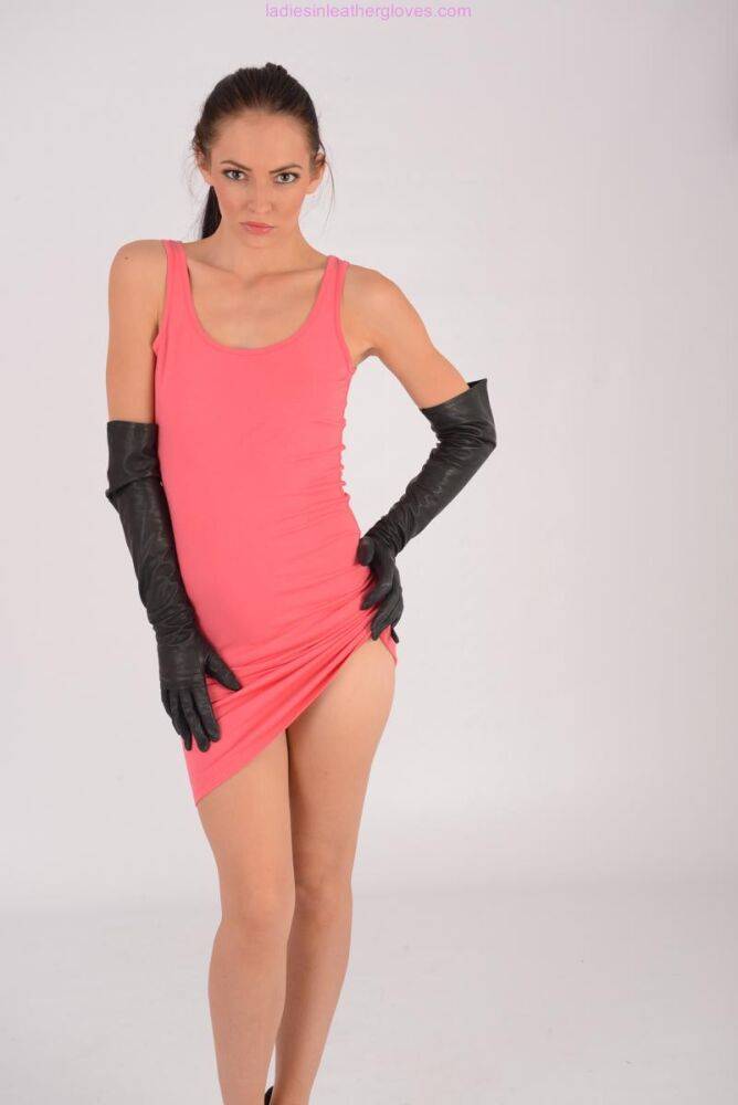 Solo model Cath sports long leather gloves while modelling in a dress - #3