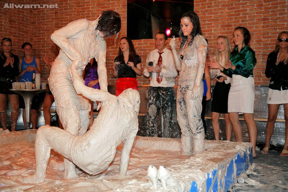 Stunning fetish ladies have some fully clothed mud wrestling fun - #8