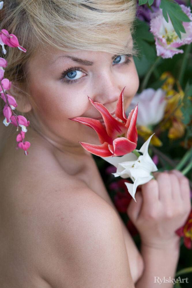 Cute young blonde Iveta poses in the nude while in a garden - #5