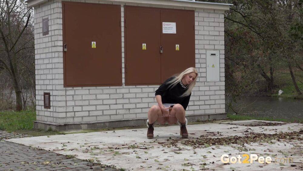 Stunning blonde squats to piss outside - #3