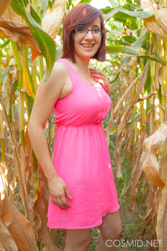 Big titted amateur Chelsea Bell disrobes in a corn field to reveal huge melons - #2