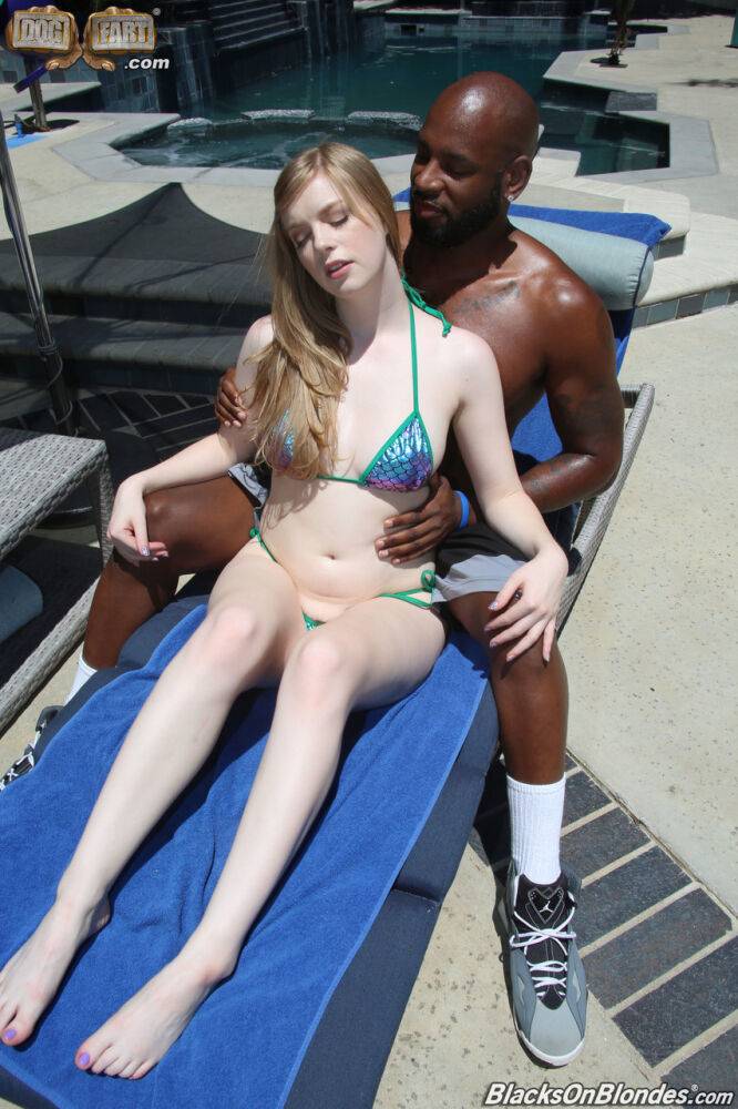 Pale blonde hottie with natural tits Dolly Leigh fools around at the pool - #9