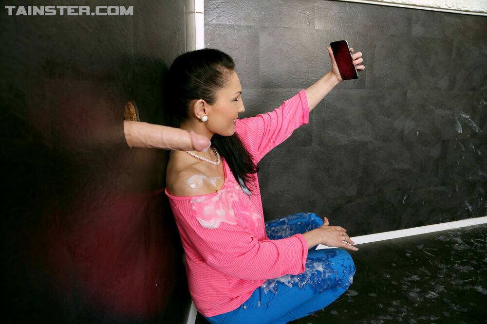 Clothed brunette takes selfie of a cock shooting jizz on her via glory hole - #4