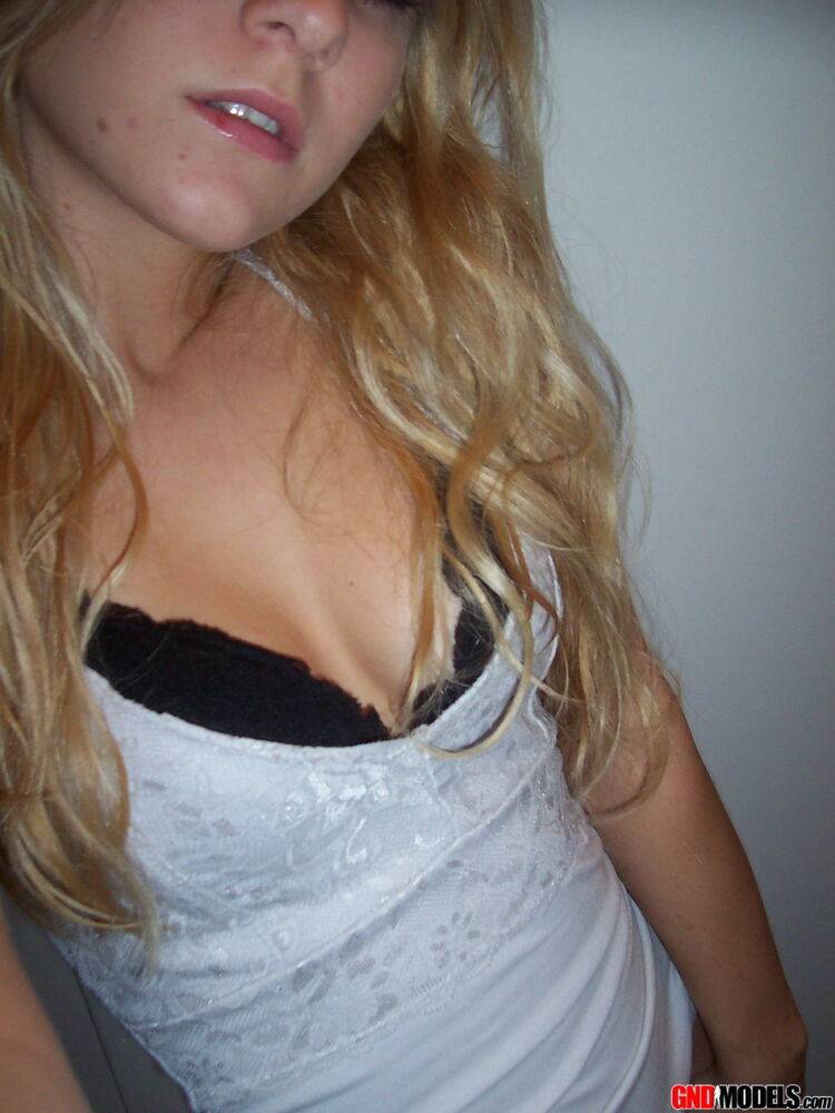 Blonde amateur Kylie takes mirror selfies while disrobing to her bra and thong - #1