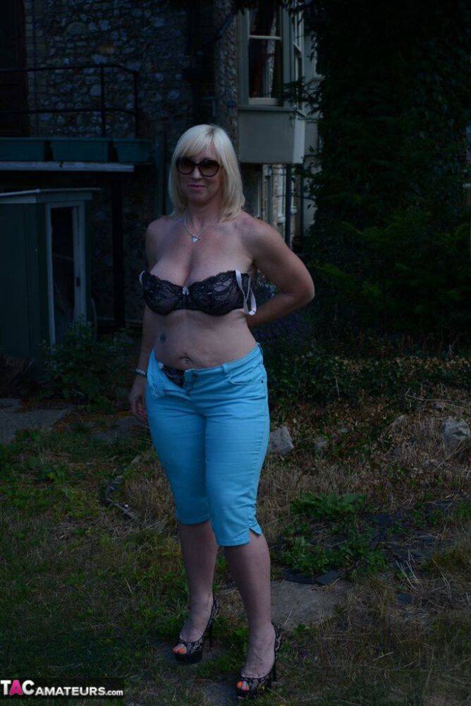 Overweight blonde woman Melody unleashes her big naturals out behind her house - #3