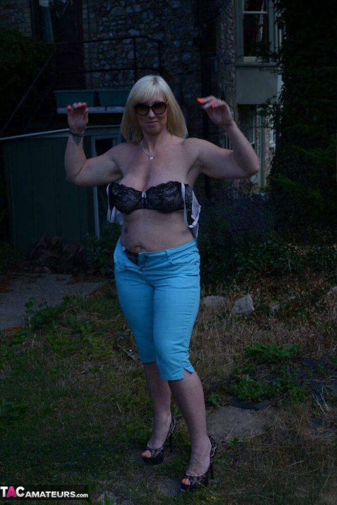 Overweight blonde woman Melody unleashes her big naturals out behind her house - #2