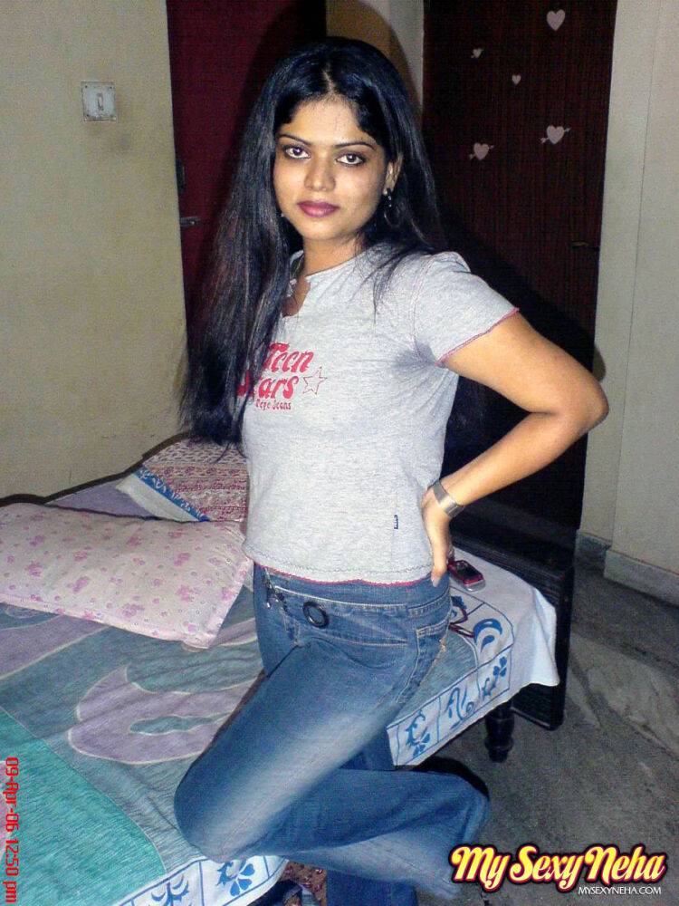 Petite Indian girl uncups big naturals after removing blue jeans - #10