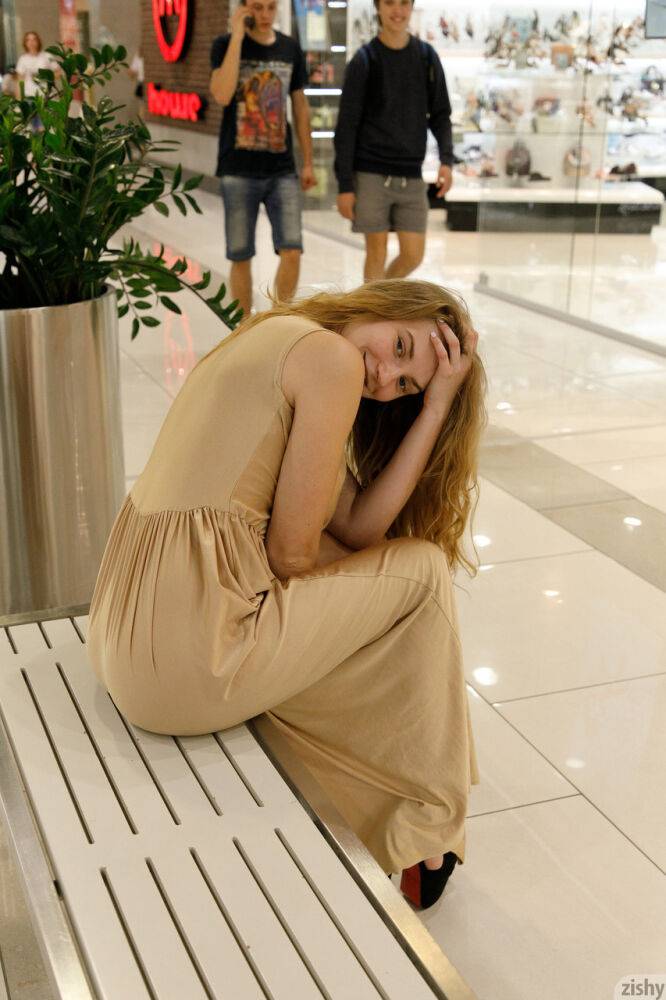 Ukrainian babe Regan Budimir flashes her big tit while posing at the mall - #9