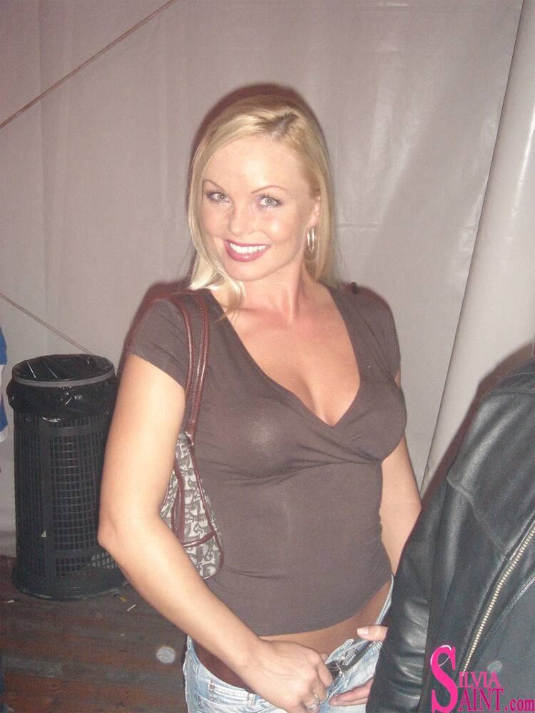 Blonde MILF Silvia Saint fully clothed posing & flaunting big tits at party - #5