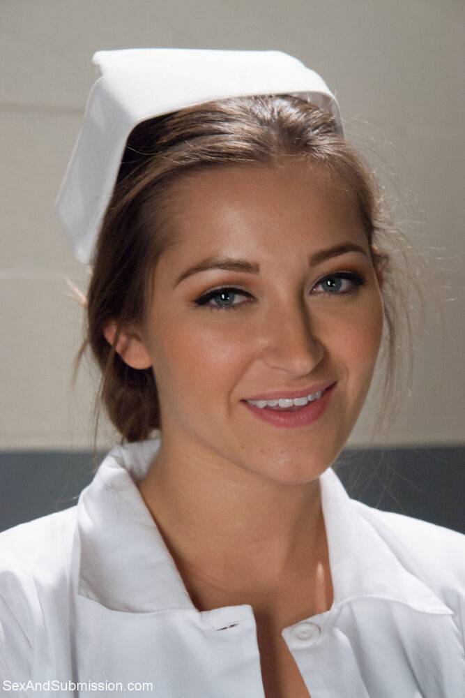 Gorgeous nurse with a nice butt Dani Daniels strips and poses in high heels - #18