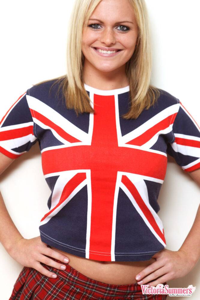 Blonde amateur Victoria Summers frees her big naturals from a Union Jack shirt - #9