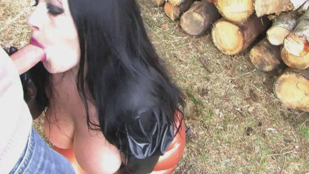 Dark-haired goth Lady Angelina shows her big tits while giving an outdoor BJ - #10