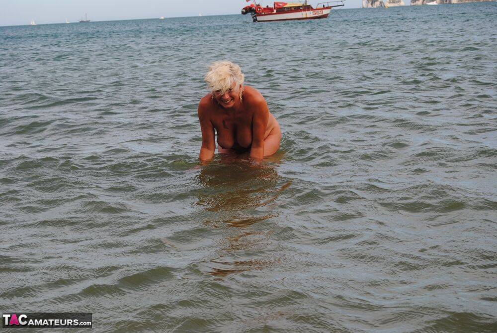 Mature granny Dimonty skinny dipping at the beach with big saggy tits hanging - #15