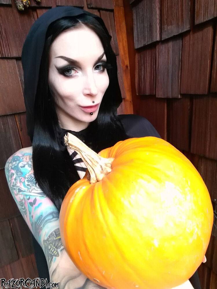 Goth girl Razor Candi flaunts her big ass over a pumpkin in Halloween attire - #2