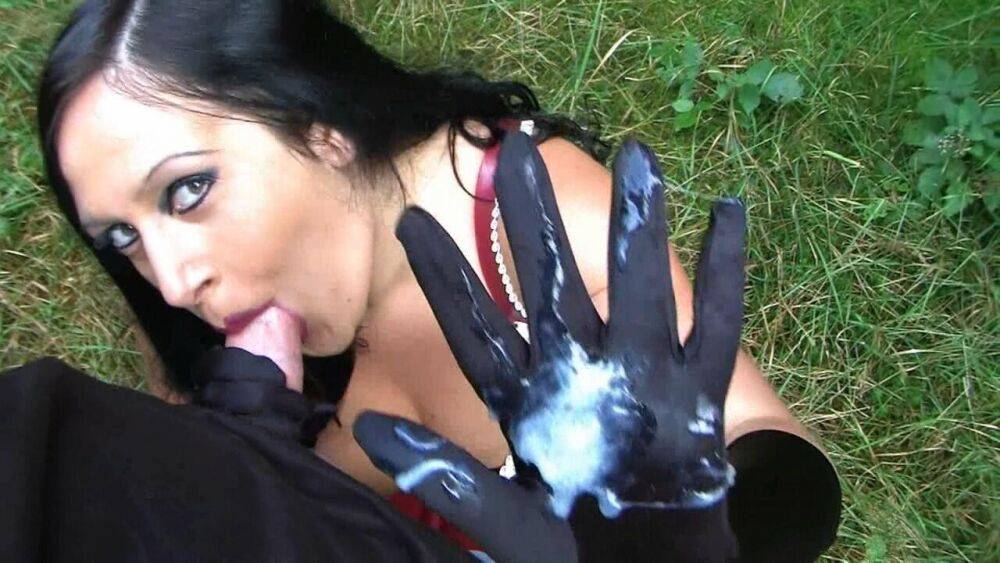 Goth woman Lady Angelina sucks the sperm from a big cock near the woods - #2