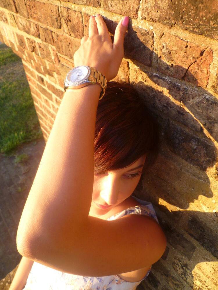 Girl next-door type Roxy shows off her new watch while outside her home - #1