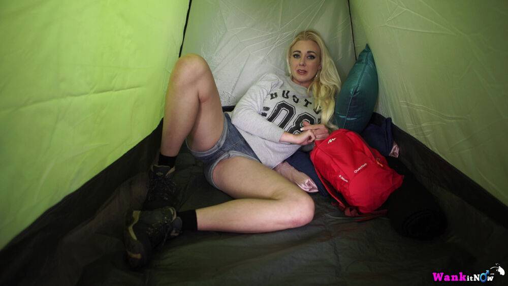 Blonde amateur pulls down her denim shorts to masturbate inside a tent - #2