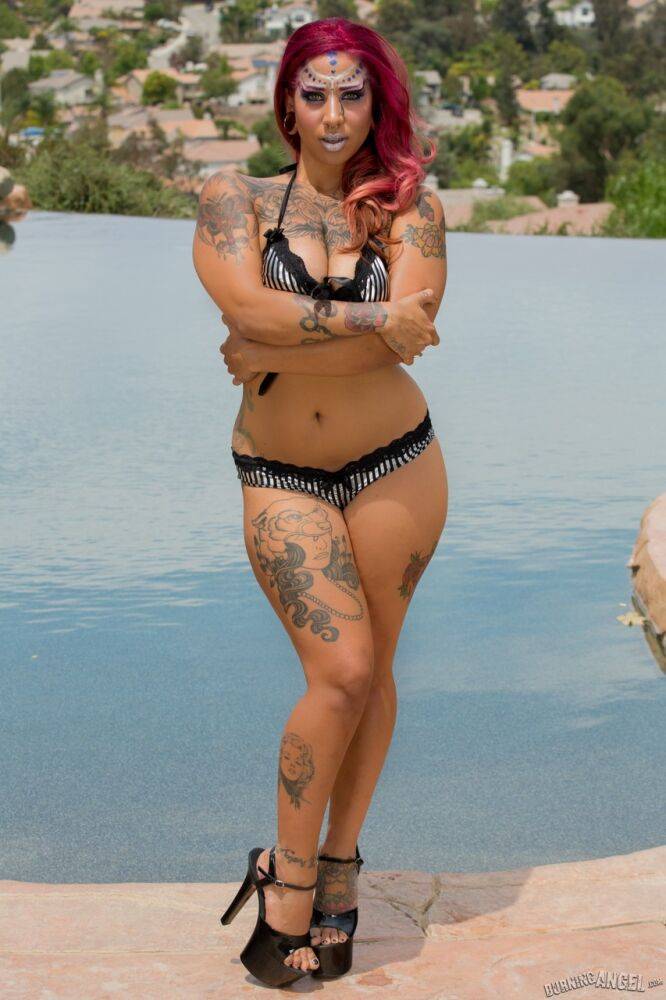 Heavily inked redhead MILF fetish model Veronica Rose freeing big tits - #11