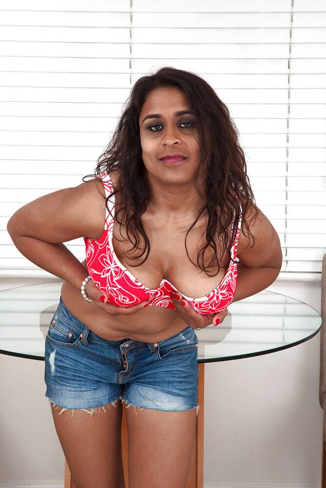 Sassy indian mature lassie in jeans shorts reveals her jugs and shaggy twat - #2